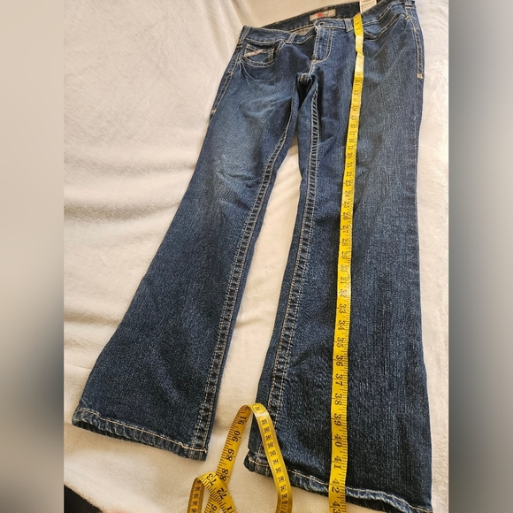 Ariat Women's Denim 33R Mid Rise Flame Resistant Boot Cut Jean - Picture 9 of 10